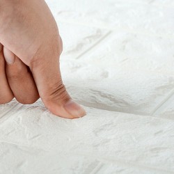 Viisi kolmiulotteista pehmeää itsekiinnittyvää vedenkestävää tiiliseinätarraa 38x35 cm